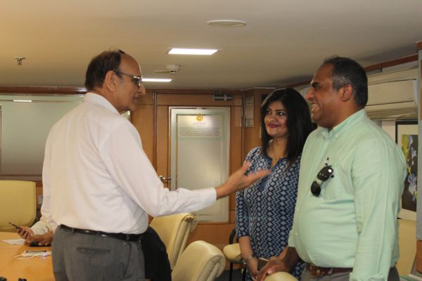 Dr. VK Singh, Ms. Suruapa Chakrabarti and Dr. Denny John interacting with each other