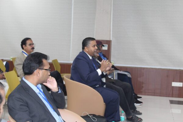 Rajeev Janardhanan questioning about DISHA Act to panelists
